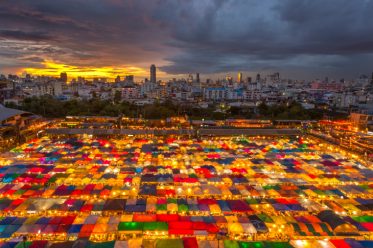 Top view multiple colour market rooftop night market at twilight, Train Night Market Ratchada
